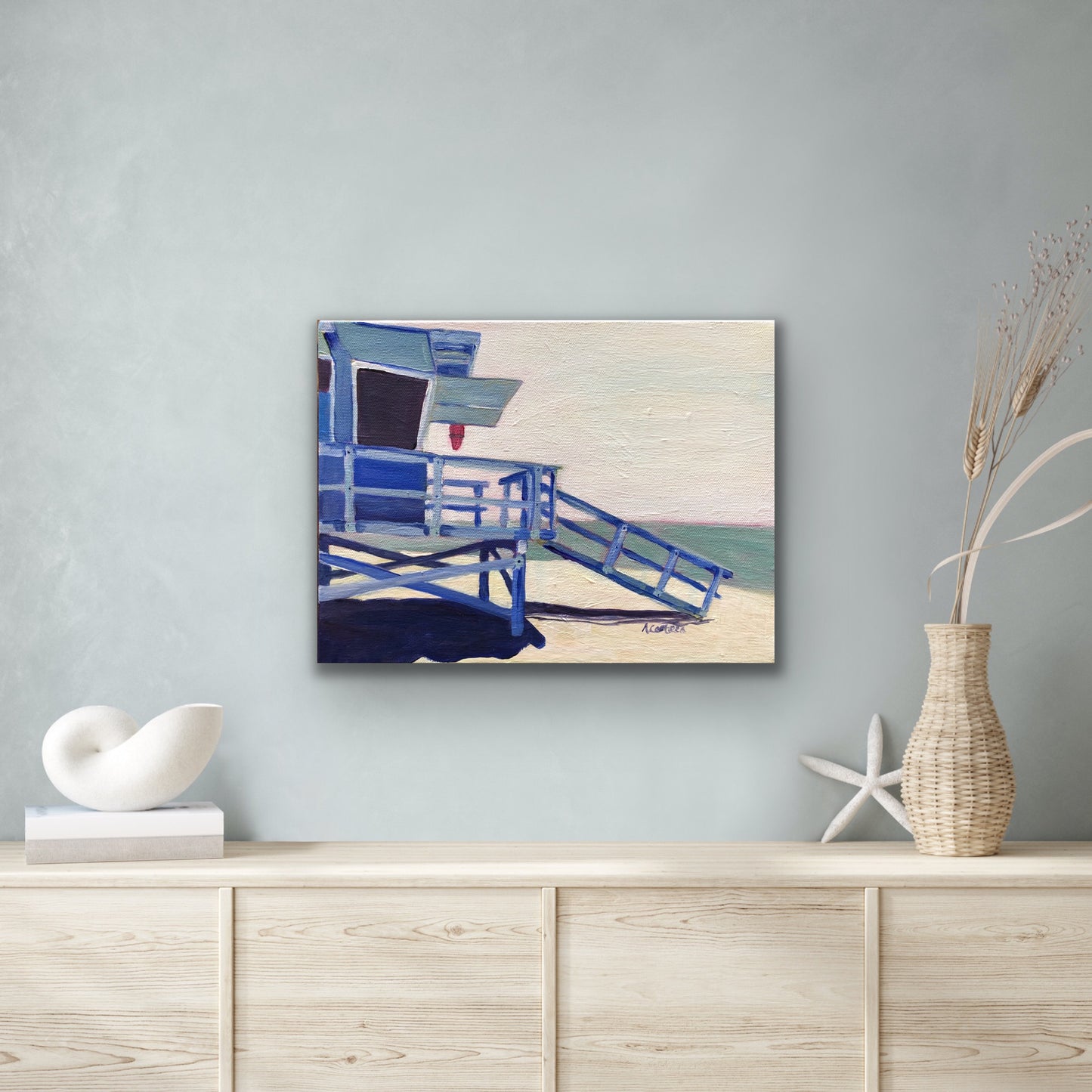 May Grey Painting on wall in seaside theme room.